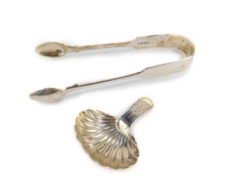 A George III silver tea caddy spoon, with a fluted bowl and bright cut engraved handle, London 1802, together with a pair of 