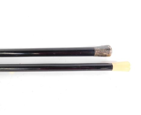 An ebony and ivory walking stick, with a horn tip, 101cm L,  together with a further ebony walking stick with a plated knop, 