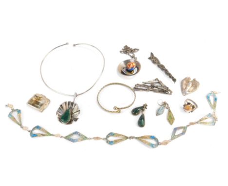 Silver jewellery designed by Dorothy Budd, including a pendant collar, pendant on chain, swan brooch, Maltese style filigree 