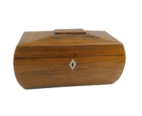 A Regency rosewood tea caddy, of sarcophagus form, with twin ring handles, the lid opening to reveal a pair of caddy boxes, f