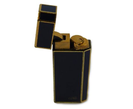 A Must De Cartier gilt metal and blue enamel pocket lighter, No 24364V.