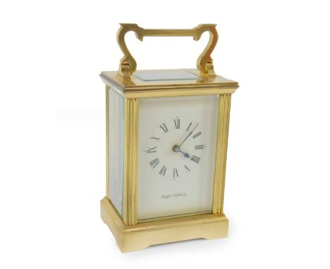 A Mappin &amp; Webb brass carriage clock, enamel dial bearing Roman numerals, no key, 12cm H.