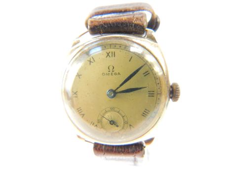 An Omega gentleman's 9ct gold cased wristwatch, circular silvered dial bearing Roman numerals, subsidiary seconds dial, movem
