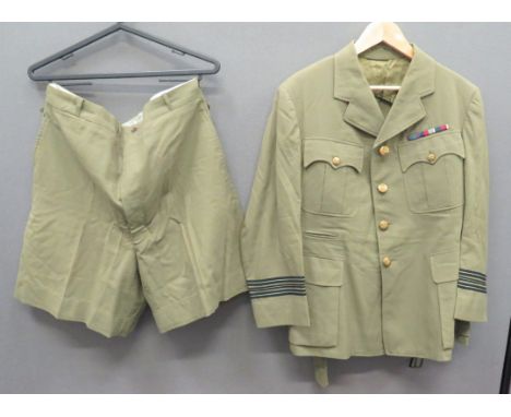 WW2 Dated RAF Tropical Tunic And Shortslight khaki green tunic. Â Single breasted, open collar tunic. Â Pleated chest pockets