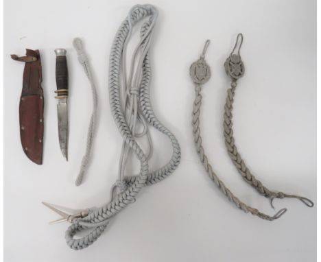 Two German Third Reich Marksman Lanyardstwisted alloy cord lanyards. Â The top overlaid with alloy wreath with central shield