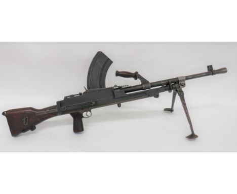 Deactivated MKII Bren Light Machine Gun.303, 24 inch barrel with front flash hider and side mounted sight. Â Top wooden carry