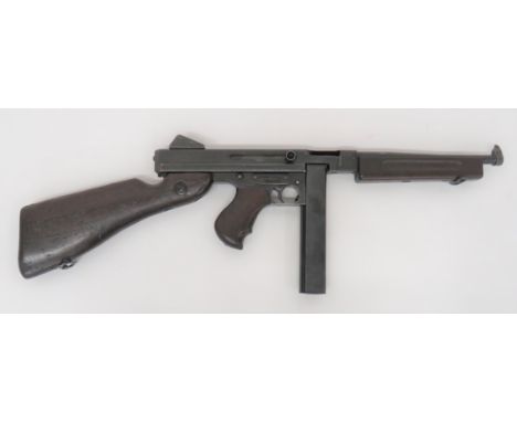 Deactivated American MIAI Thompson Sub Machine Gun.45 ACP, 11 inch blackened body. Â Front blade sight. Â Blackened body with