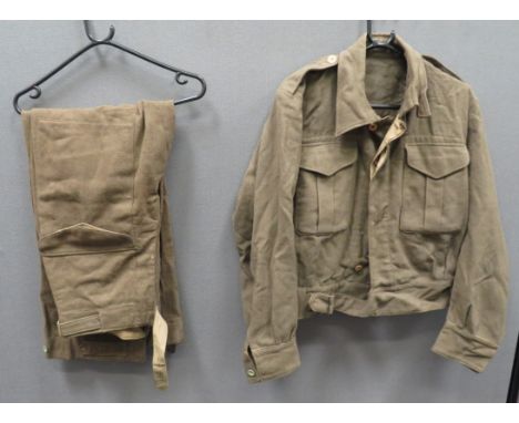 WW2 Australian Made Battledress Jacket And Trousersconsisting khaki green, closed collar, short jacket with lower extended be