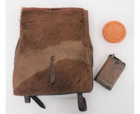 German Third Reich Pony Skin Rucksackgreen canvas bag with leather framework dated 1942. Â Pony skin front flap. Â Together w