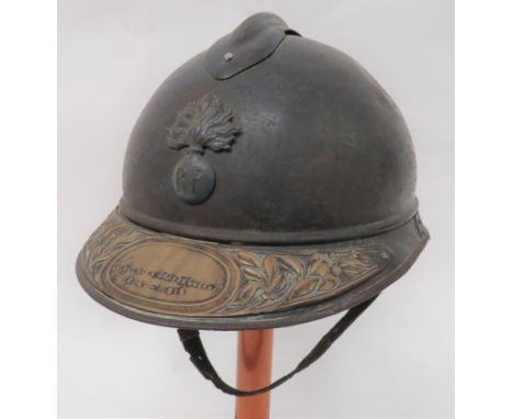 WW1 Period French Infantry Helmet blue grey painted crown with top attached comb. Â&nbsp;Lower two part brim with side joints