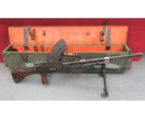 Deactivated MKI* Bren Light Machine Gun.303, 25 inch barrel with front flash hider and side mounted sight. Â Top wooden carry