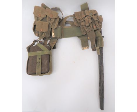 Part Set Of 1908 Pattern Webbing And SMLE Bayonetconsisting wide waist belt with rear brass tabs. Â Brass buckle. Â Pair of f