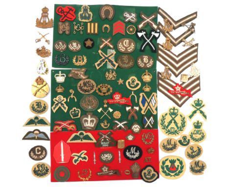 Quantity Of British Army Trade Badgesincluding brass Marksman ... Brass Drummer ... Brass MG in wreath ... Brass LG in wreath