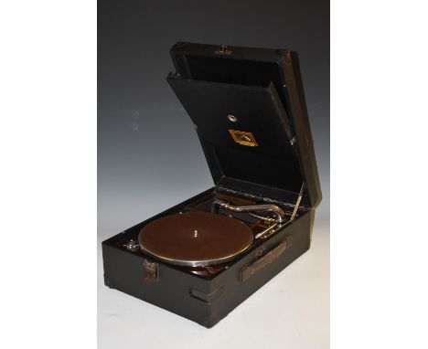 A vintage HMV portable Gramophone/Record player, retailed by Day & Co, manual wind mechanism, black case