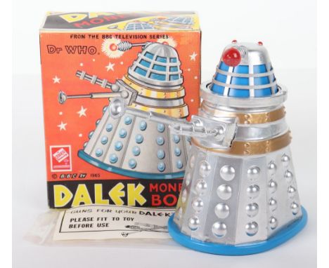 Codeg Dr.Who Dalek Money Box, circa 1965, silver/gold/blue plastic body, guns and instruction leaflet still in bag, approx he