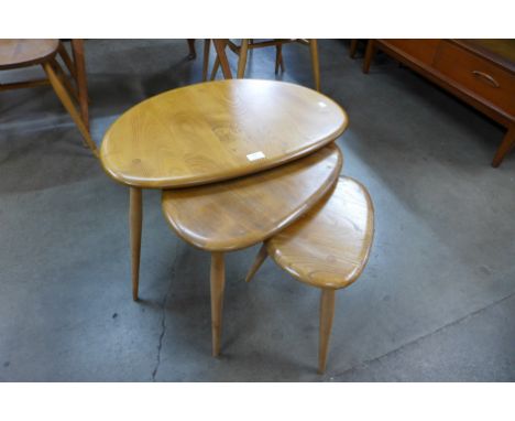 An Ercol pebble nest of tables
