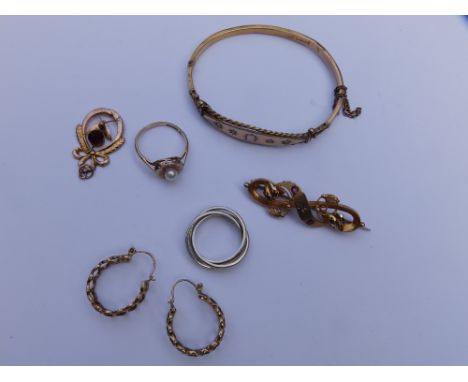 A 9ct gold bangle set with small diamonds &amp; opals - dented, a 9ct gold brooch, a pair of earrings, a pendant &amp; two ri