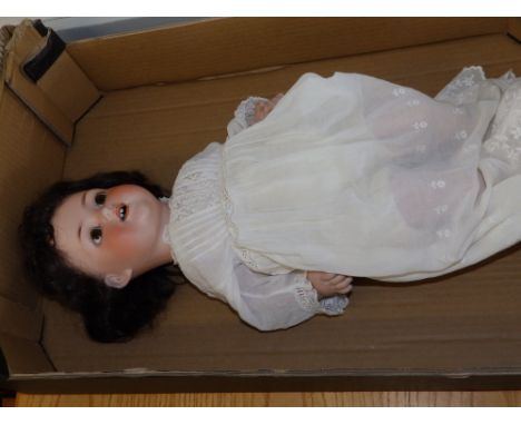 A German bisque head doll.