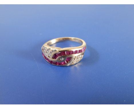 A modern ruby &amp; diamond set 18ct gold band ring.  Finger size K/L.