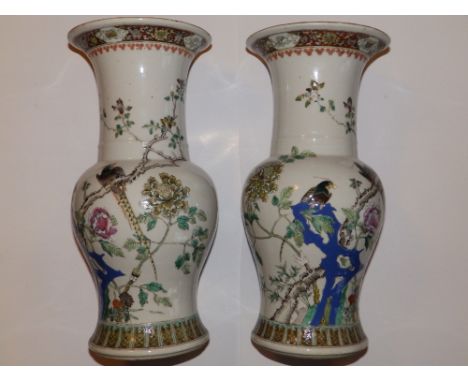 Two  Chinese porcelain famille verte vases decorated with exotic birds percehd on a blue tree trunk - blue concentric circle 