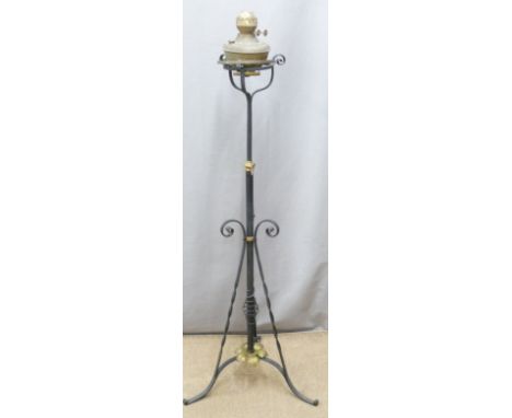 A wrought iron adjustable oil lamp and stand, H141cm