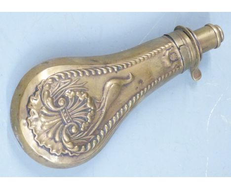 G &amp; J W Hawksley brass powder flask with embossed decoration to both sides, 19cm long.&nbsp;