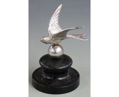Vintage car mascot formed as a bird with sphere below, on ebonised base, overall height 11.5cm