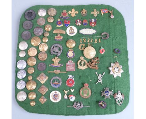 A collection of military buttons, sweetheart brooches and enamel and metal lapel badges including Army Medical Corps, Sherwoo