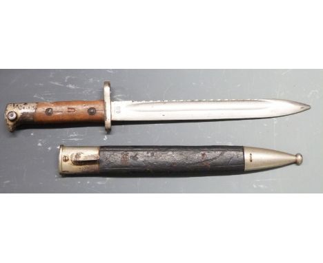 German 71/84 pattern sawback bayonet with muzzle ring and shaped grips, WK&amp;C makers to ricasso, 25cm sawback fullered bla