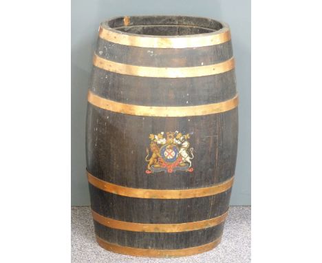 A coopered oak barrel in the form of a stick or umbrella stand marked with an armorial crest, H62 diameter 41cm