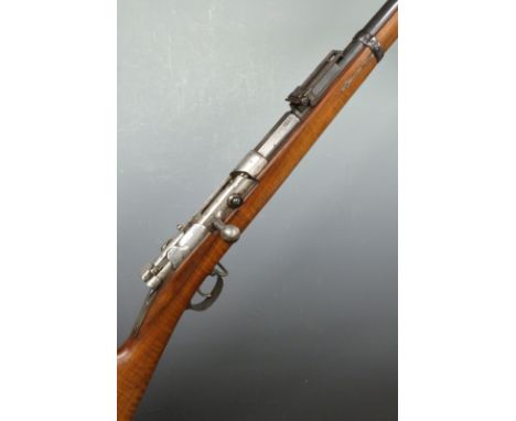 Mauser 1871/84 bolt action rifle with inpressed marks to the stock, sling suspension mounts, steel butt plate, pop-up ladder 