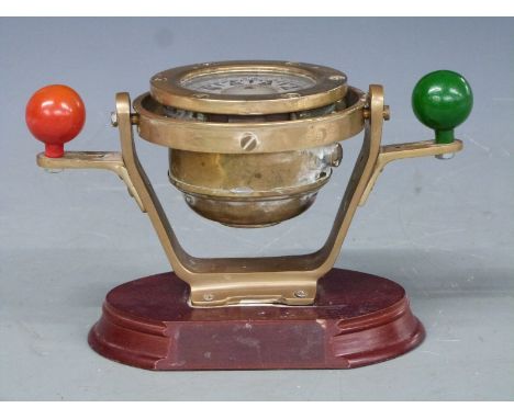 Small ship's nautical compass with Nelson's balls, on wooden base, width 23cm