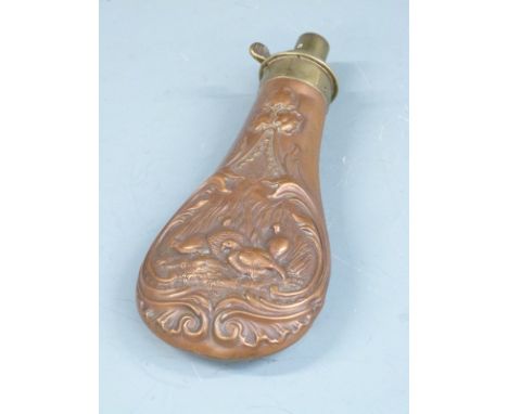 James Dixon & Sons copper and brass powder flask with embossed bird decoration, 19.5cm long. 