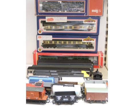 Twenty-four Hornby, Lima, BaCHmann and similar 00 gauge model railway locomotives, coaches and wagons including Flying Scotsm