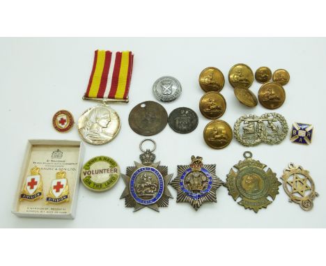 A small collection of badges and buttons including Freemasons silver gilt and silver and enamel examples,&nbsp; Red Cross Lon