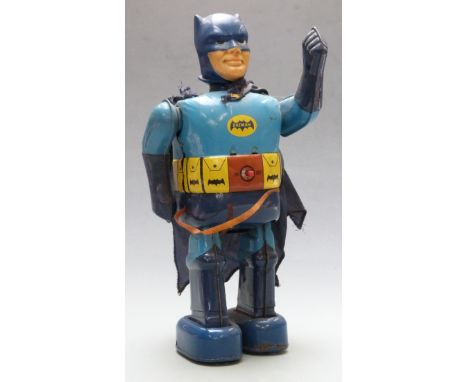 Nomura (Japan) Batman battery operated tinplate robot with two-tone blue body, vinyl head and cloth cape, 1966.&nbsp;