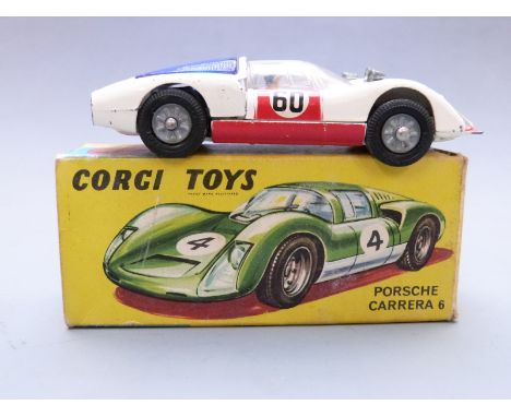 Corgi Toys diecast model Porsche Carrera 6 with white body, red bonnet and doors, blue engine cover, black interior and racin