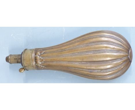 Dixon &amp; Sons copper and brass powder flask with reeded body and acanthus leaf decoration, 21cm long.&nbsp;