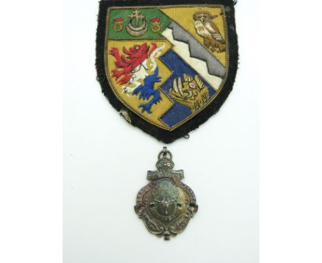 British Army 1st Battalion Seaforth Highlanders hallmarked silver sports badge 1920 together with a coat of arms blazer badge