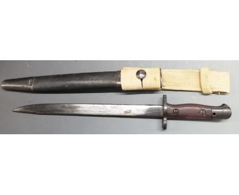 British 1907 pattern bayonet Mk1, stamped to ricasso Wilkinson, with 30cm fullered blade with false edge, scabbard and canvas