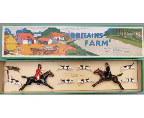 Britains Farm Hunting Series Full-Cry lead model figure set comprising huntsman, huntswoman, fox and seven hounds, 1447, in o