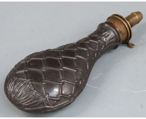 Steel and brass powder flask with embossed rope and acanthus leaf decoration to both sides, 21cm long. 