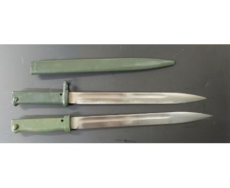 Two German Ersatz all steel bayonets, both with 31.5cm fullered blades, one with scabbard stamped 6K 4.2.6.9