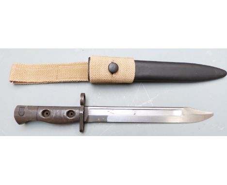 British trials X4E1 bayonet made at Enfield, stamped CA 1957 to ricasso with 20cm fullered bowie blade scabbard and frog