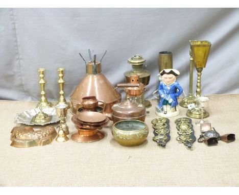 Copper and brass ware including Arts and Crafts style jardiniere, candlestick, lamp, horse brasses, kettle, shell case, music