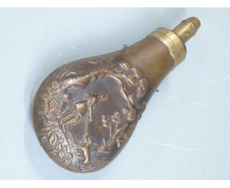 Sykes copper and brass powder flask with embossed shooting scene decoration to both sides, 18cm long. 