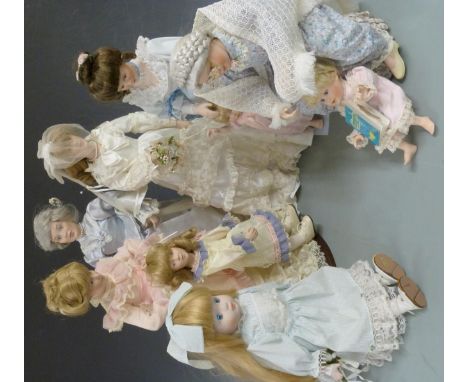 Eight various bisque headed and similar dolls, all in period clothing.&nbsp;