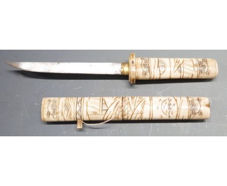 Japanese Tanto dagger with carved bone handle and scabbard depicting figures and 15.5cm blade, overall length 31cm