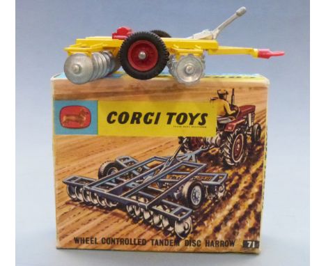 Corgi Toys diecast model Wheel Controlled Tandem Disc Harrow with yellow red and silver body, 71, in original box.