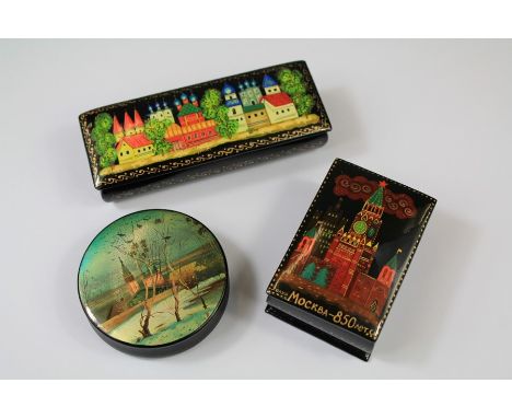 20th Century Hand Painted Russian Boxes. The first box depicting a 'View of a Town', approx 11 x 4 cms signed by the artist, 